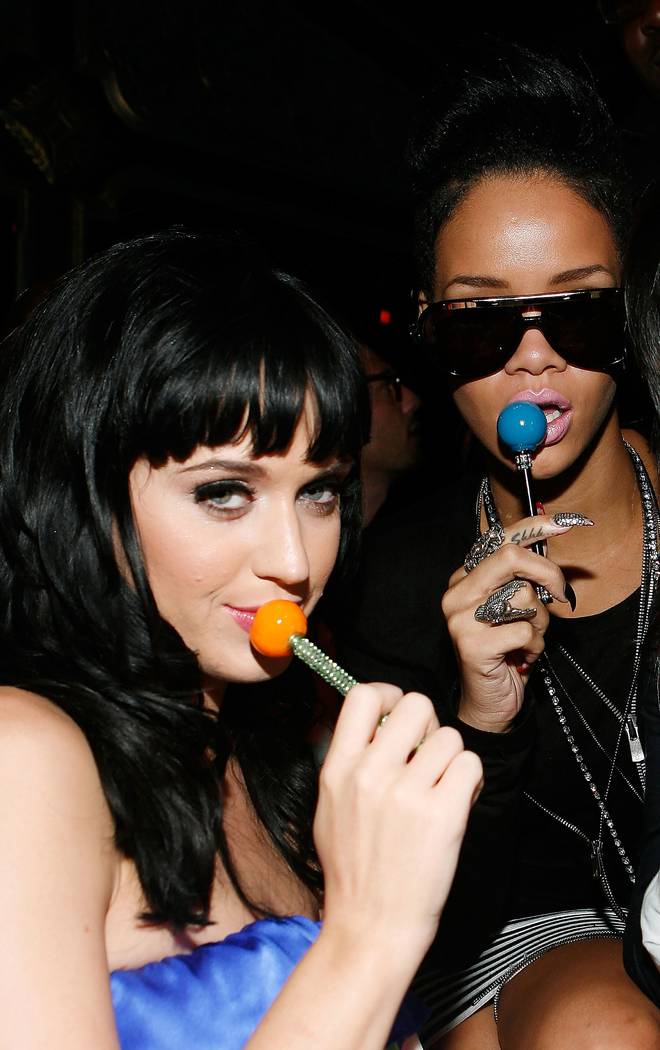 Amy Sussman/Getty Images for The Griffin
NEW YORK - JULY 28:  Singers Katy Perry (L) and Rihanna (R), with Sugar Factory Couture Lollipop, attend a post concert party at The Griffin on July 28, 20 ...