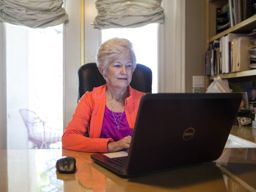 Writer/advocate Nancy Nelson, 74, works on a poem in her office on Monday, February 5, 2018, in Las Vegas. Nelson was diagnosed with early onset Alzheimerճ disease in 2013, and attributes mu ...
