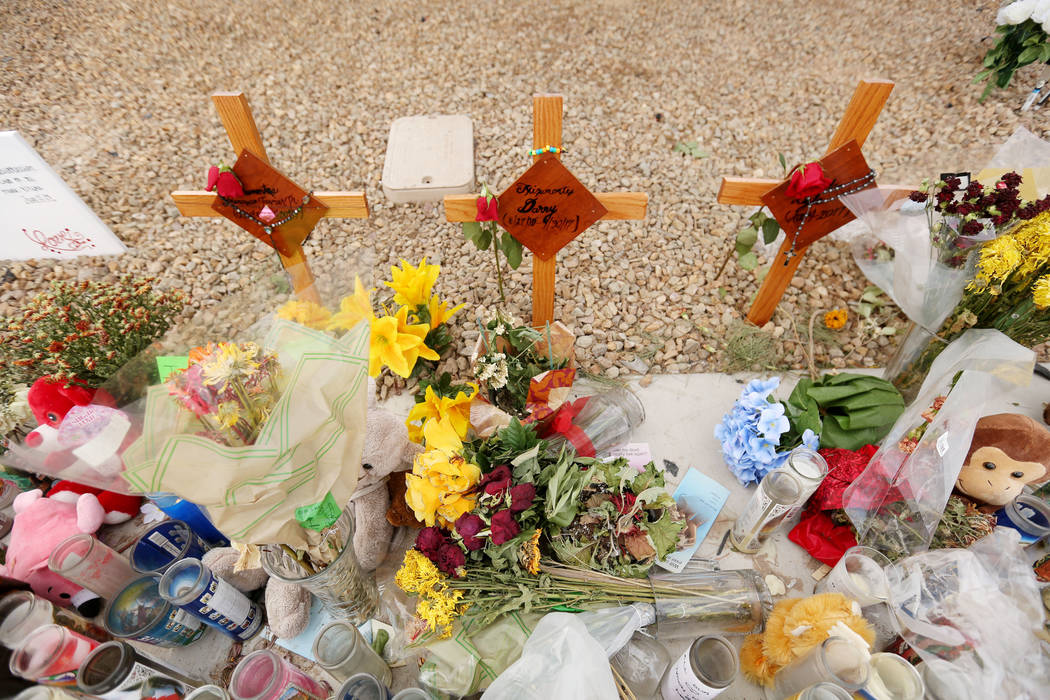 Three crosses with the names of three juveniles between the ages of 12 and 15 that were hit by a car on Desert Inn Road and east of Nellis Boulevard, at a memorial site Wednesday, Oct. 18, 2017 i ...