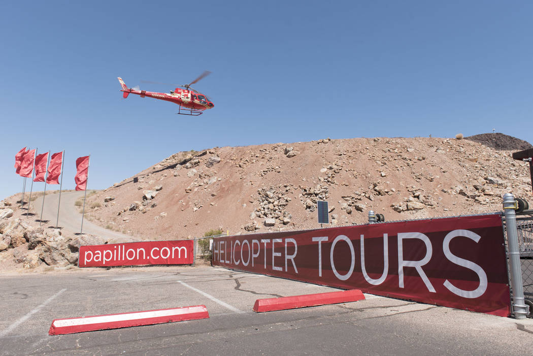 A tour group returns to Papillon Grand Canyon Helicopters' new Hoover Dam helipad located adjacent to Hoover Dam Lodge hotel-casino in Boulder City, Thursday, Sept. 8, 2016. Jason Ogulnik/Las Vega ...
