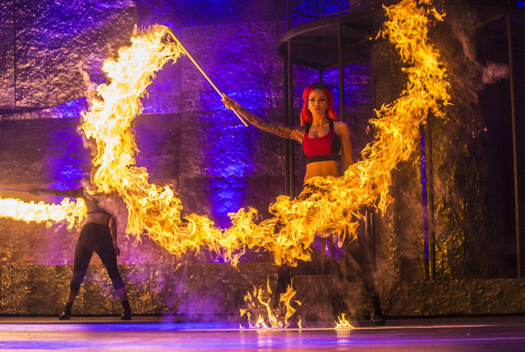 Fire dancer Teta Maria Stone, right, performs with a pyro prop during a walk through for the new show Inferno on Thursday, January 18, 2018, at Paris hotel-casino, in Las Vegas. Benjamin Hager Las ...