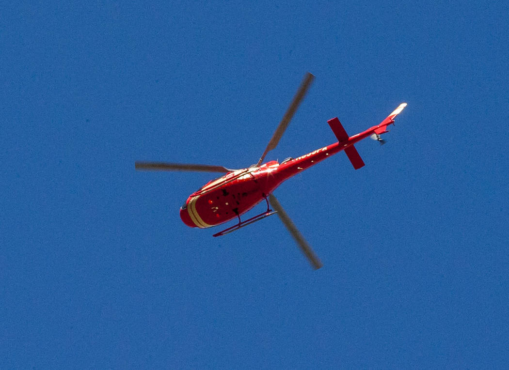 A helicopter flies over East Diamond Bar Road on the Hualapai Nation Indian Reservation in Arizona on Sunday, Feb. 11, 2018.  Patrick Connolly Las Vegas Review-Journal @PConnPie