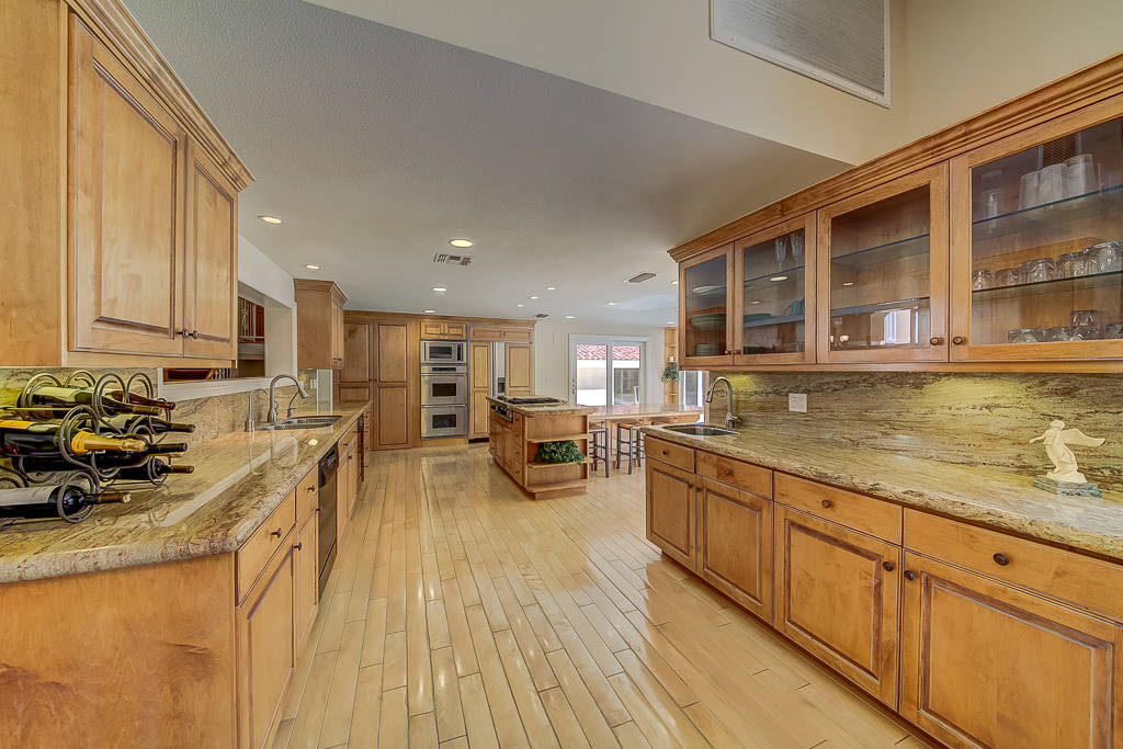 The home has an open kitchen with island. (Nevada Realty Connection)