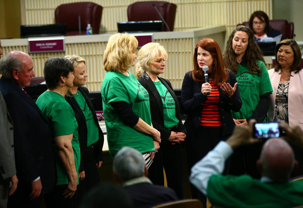 Henderson Mayor Debra March, in red, recognizes the founding of the Black Mountain Neighborhood Association during a Henderson City Council meeting on Tuesday, Feb. 20, 2018. The Black Mountain Go ...