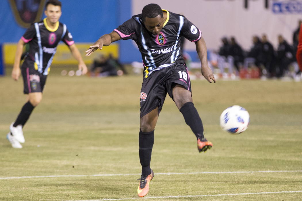 Las Vegas Lights FC’s Freddy Adu (19) take a shot at the goal against D.C. United during the second half of the exhibition soccer game at Cashman Field in Las Vegas, Saturday, Feb. 24, 2018 ...