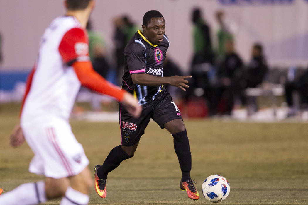 Las Vegas Lights FC's Freddy Adu (19) runs with the ball against D.C. United during the second half of the exhibition soccer game at Cashman Field in Las Vegas, Saturday, Feb. 24, 2018. Erik Verdu ...