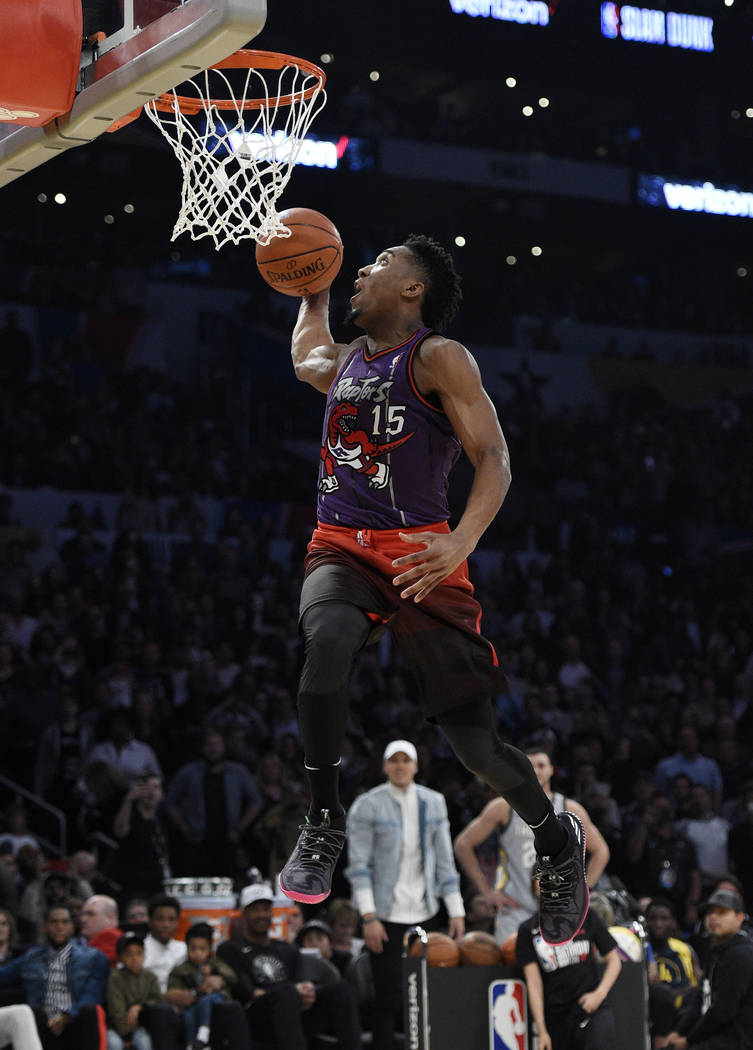 The Latest: Jazz rookie Mitchell wins slam dunk contest