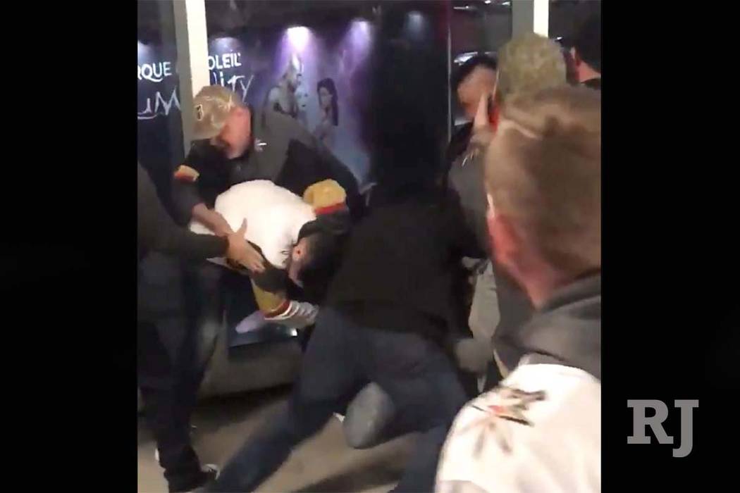 A fight broke out in the stands between fans at the NHL game of the Vegas Golden Knights and Anaheim Ducks at T-Mobile Arena in Las Vegas on Monday night, Feb. 19, 2018. (Screen grab/Twitter/@Andr ...