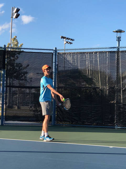 Michael Andre practices at Darling Tennis Center on Feb. 13. (Saad Ashraf)