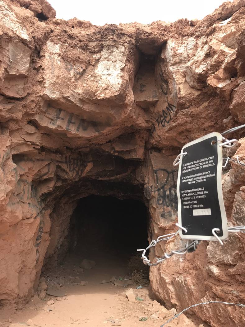 Someone has rolled back the barbed wire fence that once blocked the entrance to this abandoned mine shaft near Fort Apache and Warm Springs roads on Wednesday, Feb. 21, 2018. (Henry Brean/Las Vega ...