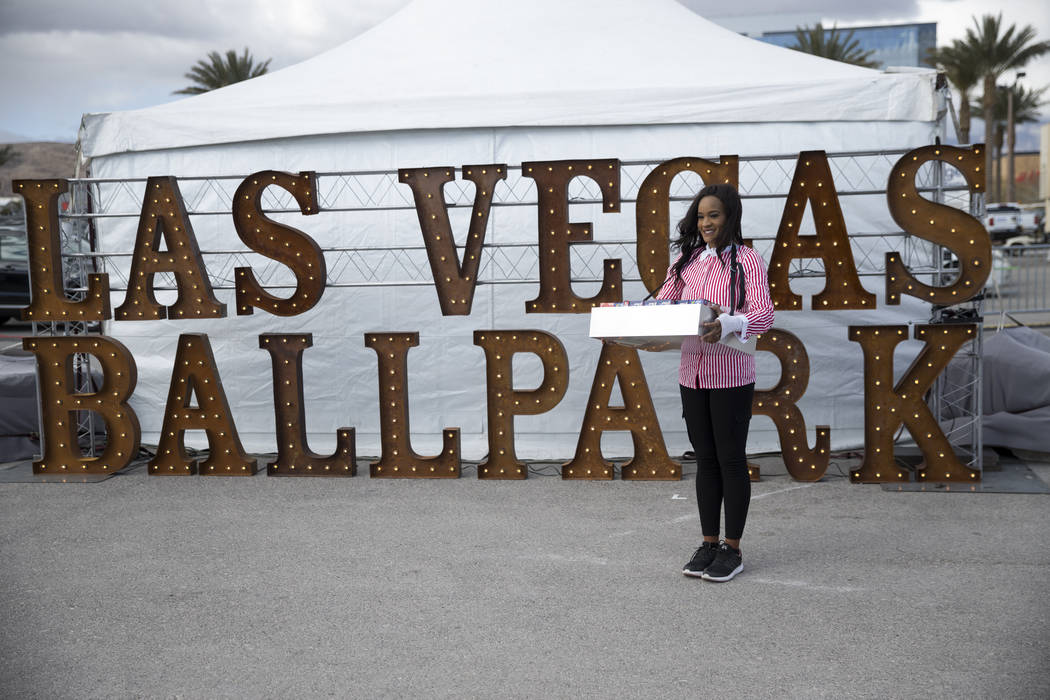 Cherise Bryant-Ortiz hands out snacks during the groundbreaking ceremony for the Las Vegas 51s future stadium in Summerlin, Las Vegas, Friday, Feb. 23, 2018. Erik Verduzco Las Vegas Review-Journal ...