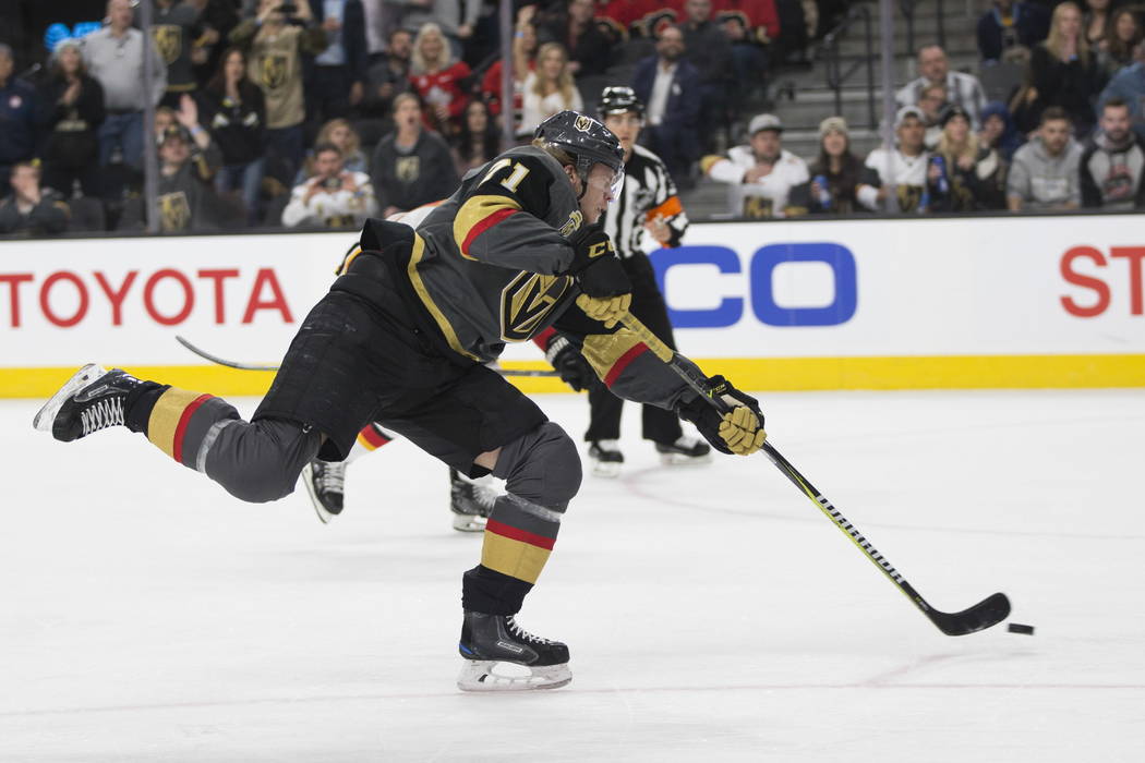 Vegas Golden Knights center William Karlsson (71) shoots the puck against Calgary Flames during the first period of an NHL game  at T-Mobile Arena in Las Vegas, Wednesday, Feb. 21, 2018. Erik Verd ...