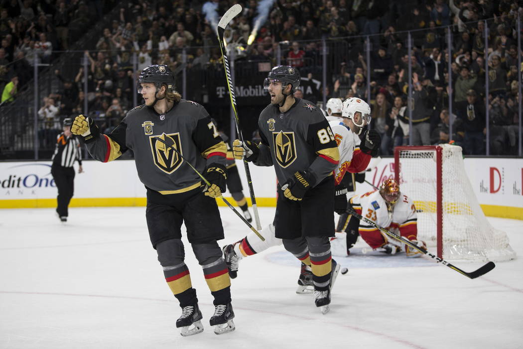 Vegas Golden Knights center William Karlsson (71) celebrates his score with right wing Alex Tuch (89) during the first period of an NHL game at T-Mobile Arena in Las Vegas, Wednesday, Feb. 21, 20 ...