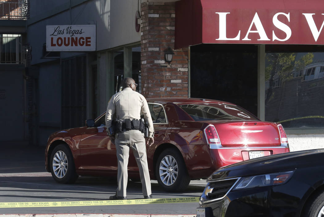 Las Vegas police investigate a shooting at the Las Vegas Lounge, 900 E. Karen Ave on Friday, Feb. 23, 2018, in Las Vegas. Bizuayehu Tesfaye/Las Vegas Review-Journal @bizutesfaye