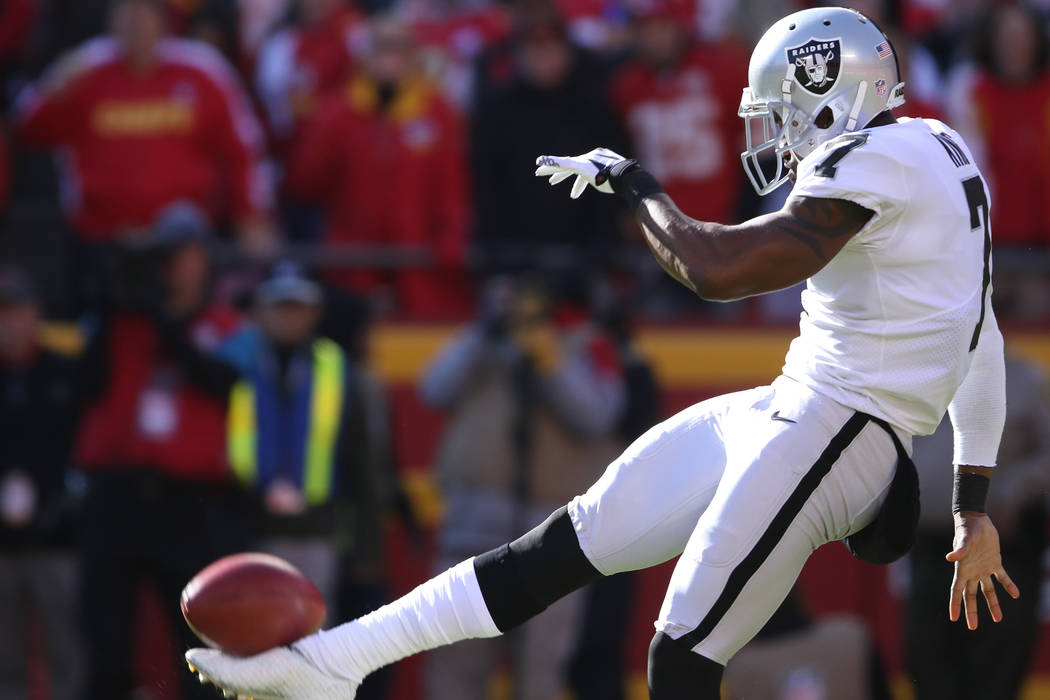 Oakland Raiders punter Marquette King (7) punts the football during the first half of a NFL game against the Kansas City Chiefs in Kansas City, Mo., Sunday, Dec. 10, 2017. Heidi Fang Las Vegas Rev ...