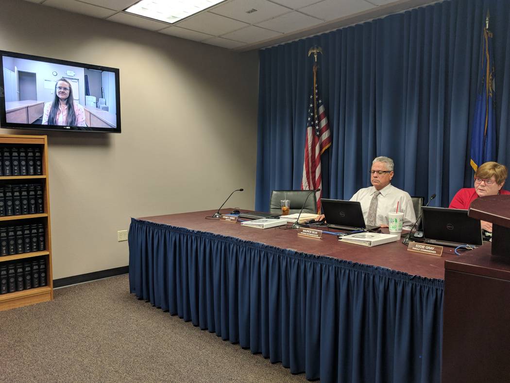 Jessica Williams, left, testified via videoconference on Feb. 27, 2018 in front of Nevada Board of Parole Commissioners hearing representative Maurice Silva, middle, and Chairwoman Connie Bisbee,  ...
