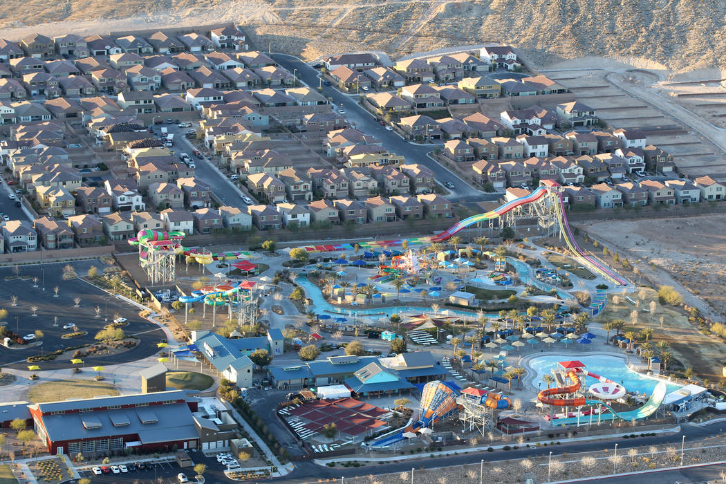 Southwest Las Vegas homes and Wet 'n' Wild water park are seen from a hot air balloon piloted by Daniel Liberti of Rainbow Ryders during an early morning flight Wednesday, Jan. 24, 2018. K.M. Cann ...
