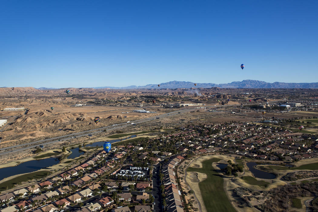 Balloons dot the sky over Mesquite during the seventh annual Mesquite Balloon Festival on Friday, Jan. 26, 2018.  Patrick Connolly Las Vegas Review-Journal @PConnPie