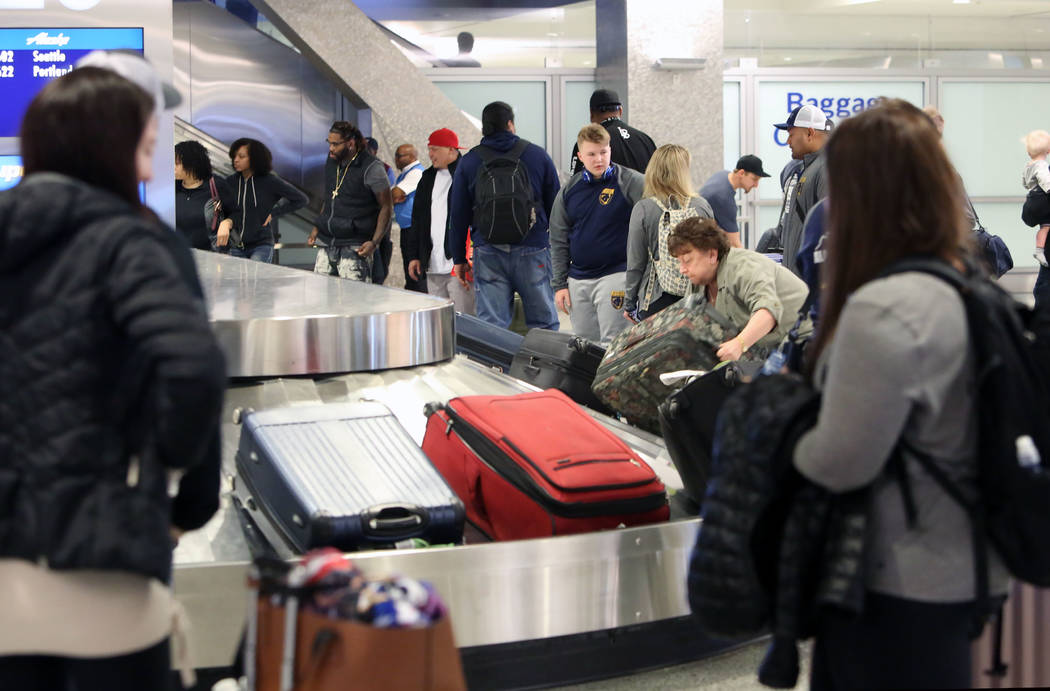 Arriving passengers wait for their luggage at the baggage claim area at Terminal-3 at McCarran International Airport on Wednesday, Feb. 28, 2018, in Las Vegas. Bizuayehu Tesfaye/Las Vegas Review-J ...
