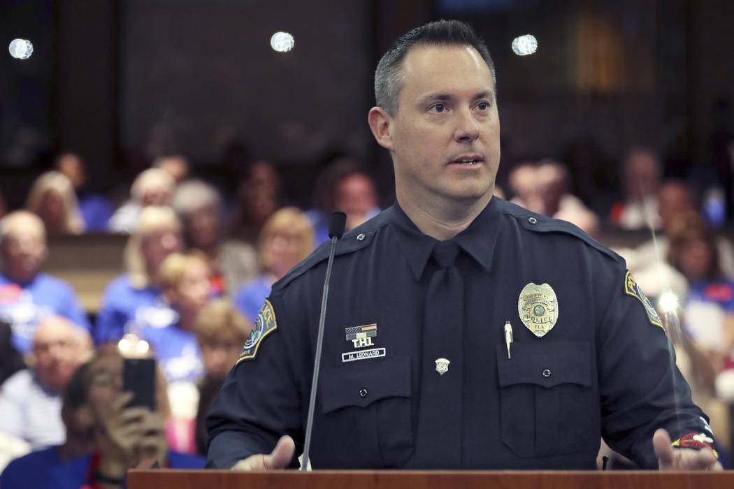Coconut Creek Police Officer Michael Leonard speaks before the Broward County Commission meeting in Fort Lauderdale on Tuesday, Feb. 27, 2018, after it was proclaimed that February 27 is Officer M ...