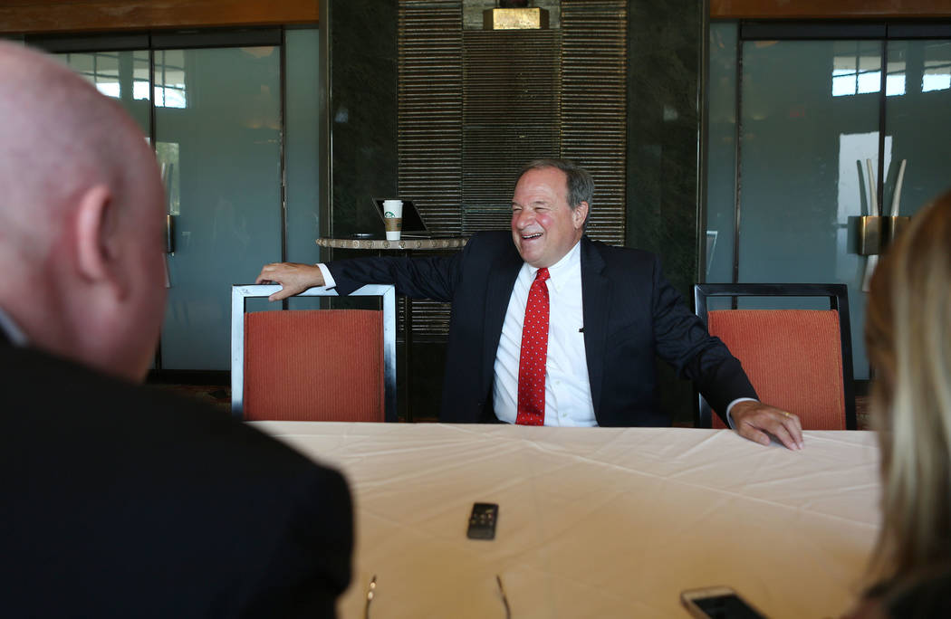 Nevada Treasurer Dan Schwartz speaks to media after announcing his campaign for Governor on at the Republican Men's Club monthly Luncheon at Cili Restaurant at Bali Hai Golf Course in Las Vegas, T ...
