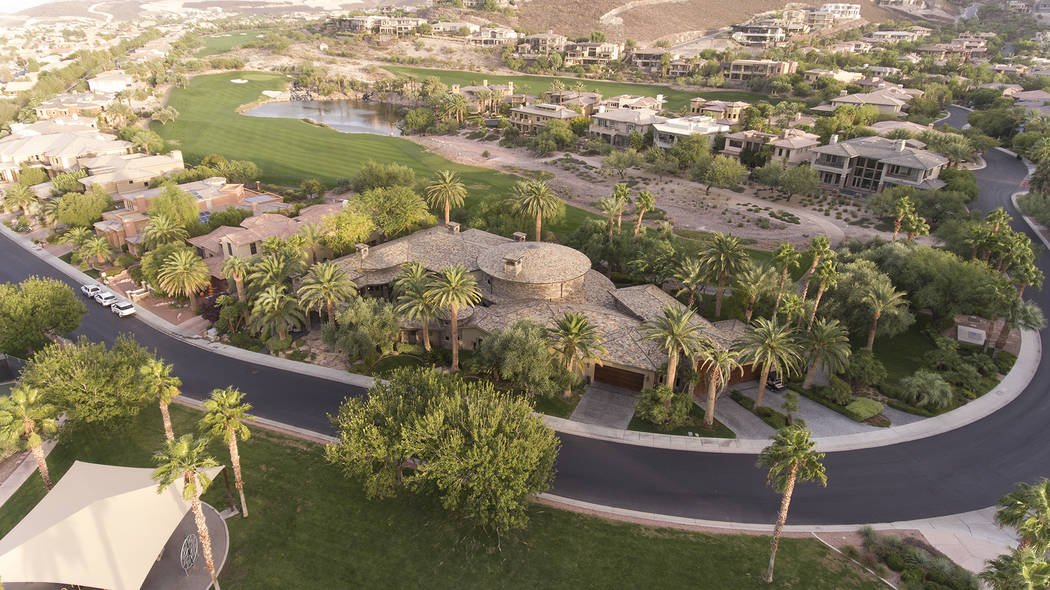 Dragon Rock at MacDonald Highlands sits on the seventh hole of DragonRidge Golf Course. It's listed for $3.5 million. (Synergy/Sotheby’s International Realty)