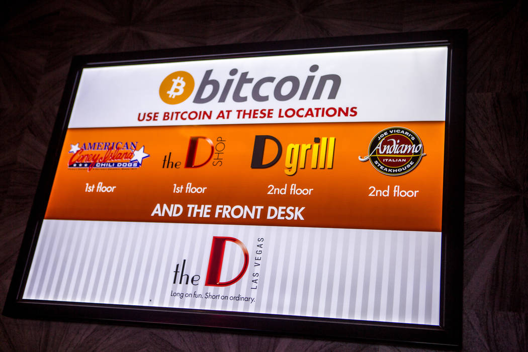 Signs advertise the use of Bitcoin at the D Las Vegas on Thursday, Feb. 15, 2018. The hotel-casino is now accepting Bitcoin at some of its restaurants, gift shop and hotel desk.  Patrick Connolly  ...