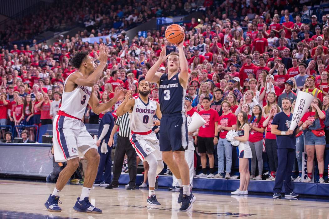 Utah State's Sam Merrill shoots against Gonzaga on Nov. 18, 2017, in Spokane, Washington. Photo courtesy of Utah State athletics.