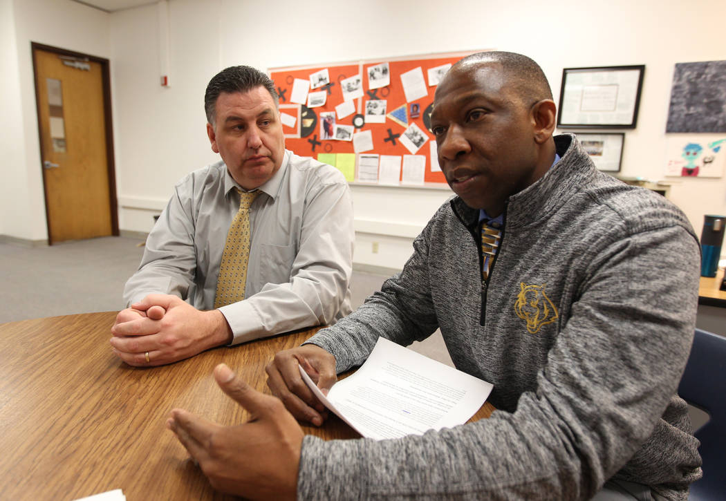 Principal Joe Petrie, left, and Behavioral Strategist Jermone Riley of Bonanza High School in Las Vegas talk to a reporter at the school Wednesday, Feb. 21, 2018. Riley's position, to proactively  ...