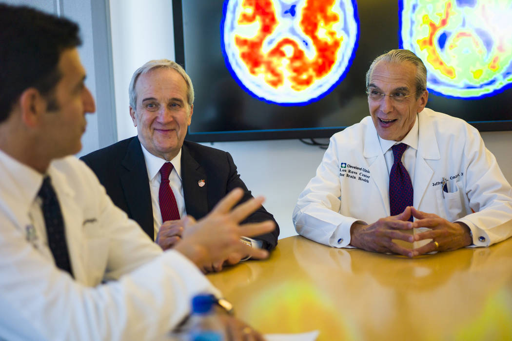 Dr. Marwan Sabbagh, who is taking over as the new director of the Cleveland Clinic Lou Ruvo Center for Brain Health, from left, talks with founder Larry Ruvo and current director Dr. Jeffrey Cummi ...