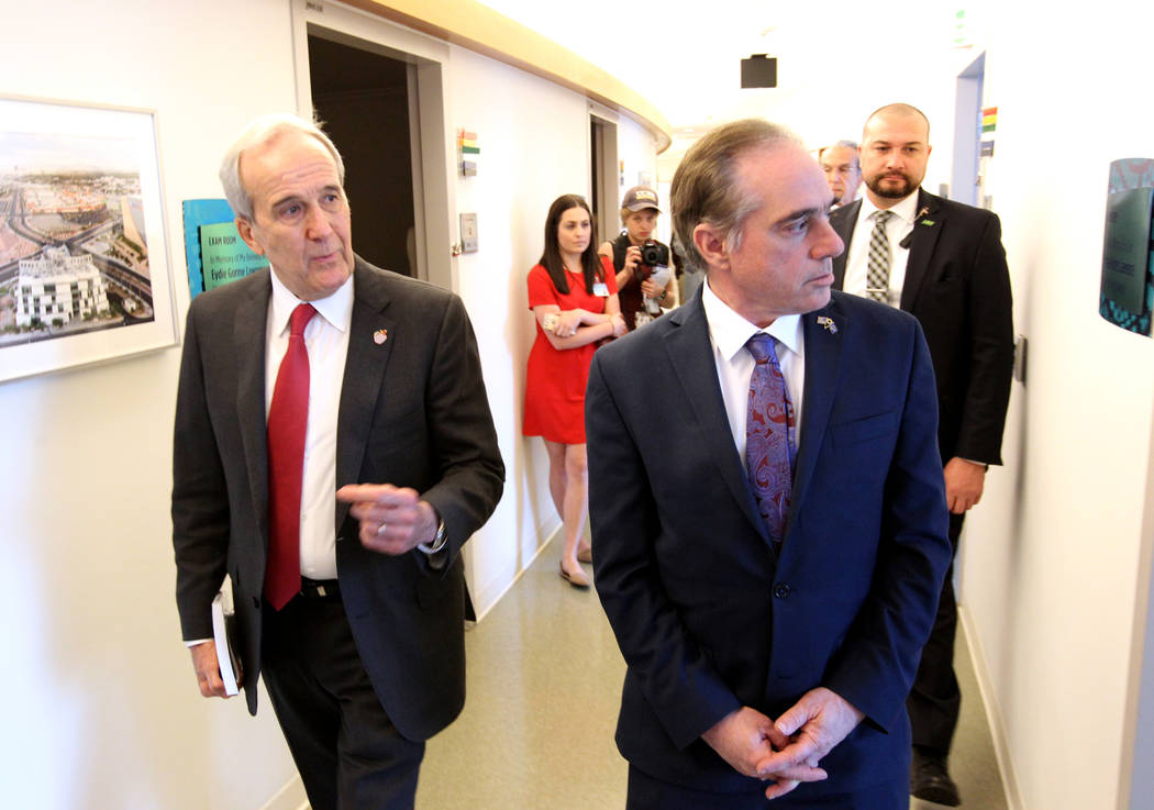 Secretary of Veteran's Affairs David Shulkin, right, gets a tour of the Lou Ruvo Center for Brain Health, Cleveland Clinic from founder Larry Ruvo Friday, March 9, 2018. Shulkin visited the Las Ve ...