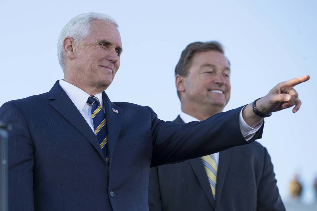 Vice President Mike Pence, left, will campaign for Nevada Sen. Dean Heller in April. Pence was in Las Vegas with Heller for a pair of Air Force events in January. (Richard Brian/Las Vegas Review-J ...