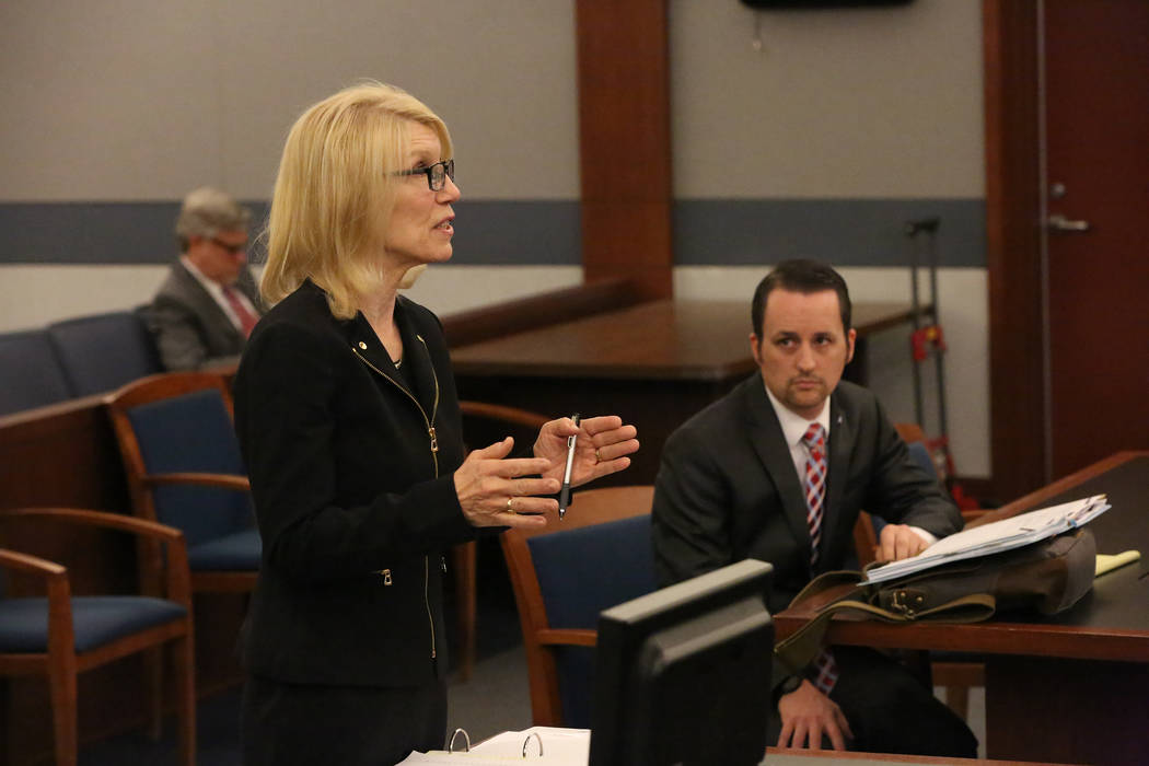 Samuel Warren, right, listens as Alice Denton attorney for Larry Bertsch, requests that Judge Gloria Sturman appoint Bertsch special administrator of the estate of Stephen Paddock on Thursday, Mar ...
