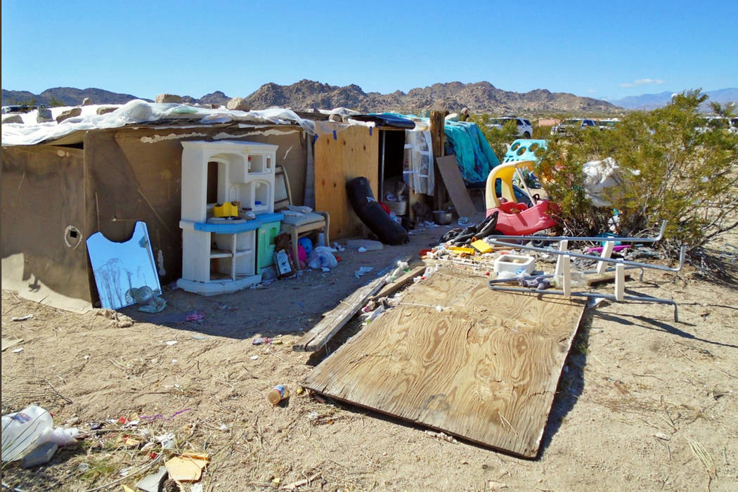 A ramshackle structure, where authorities say a couple, their three children and dozens of cats were living in filthy conditions, is seen in unincorporated Joshua Tree in Southern California's Moj ...