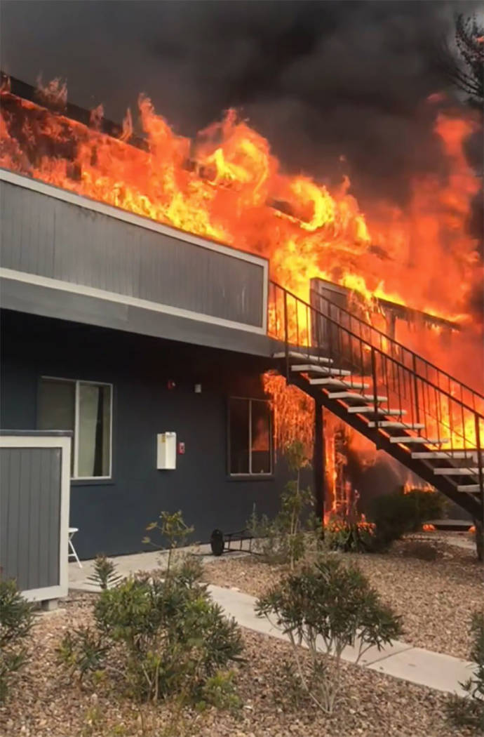 Flames engulf units at the Cornerstone Crossing Apartments in Las Vegas on Saturday. (Las Vegas Fire and Rescue via Twitter)