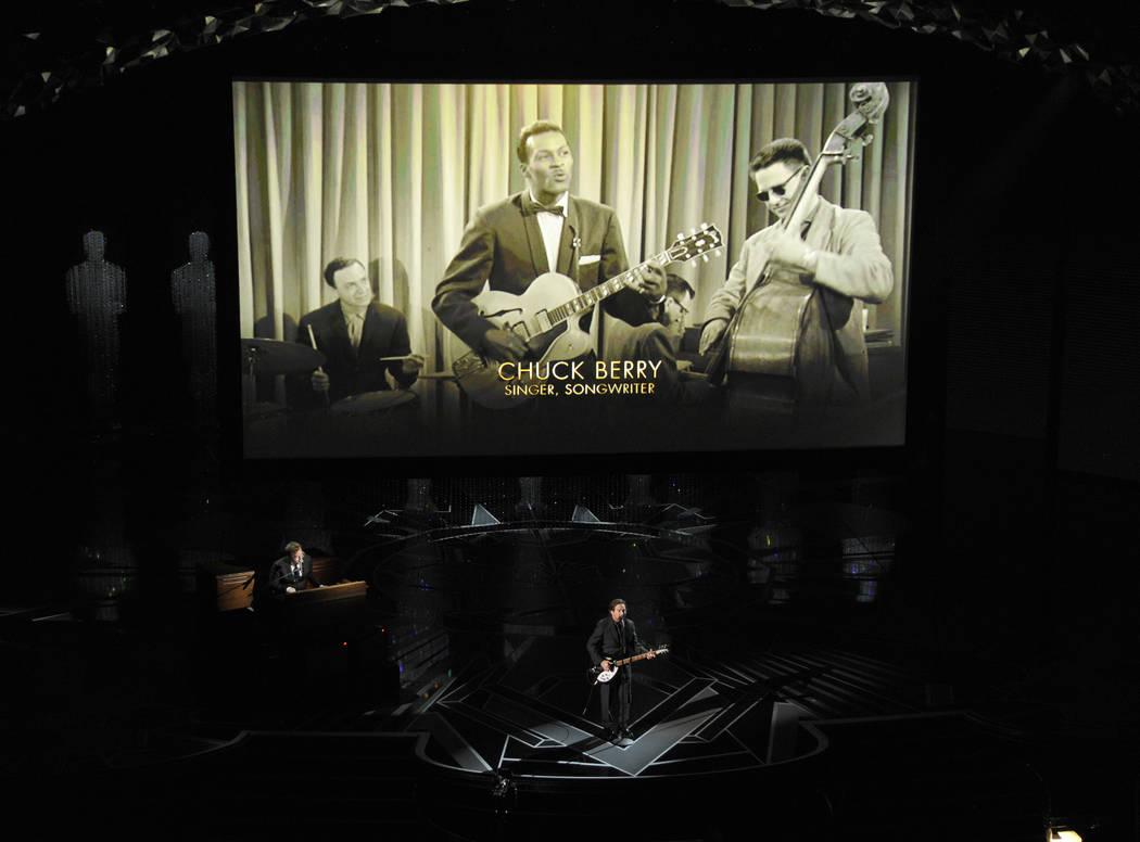 Chuck Berry appears on screen as Eddie Vedder performs during an In Memoriam tribute at the Oscars on Sunday, March 4, 2018, at the Dolby Theatre in Los Angeles. (Photo by Chris Pizzello/Invision/AP)