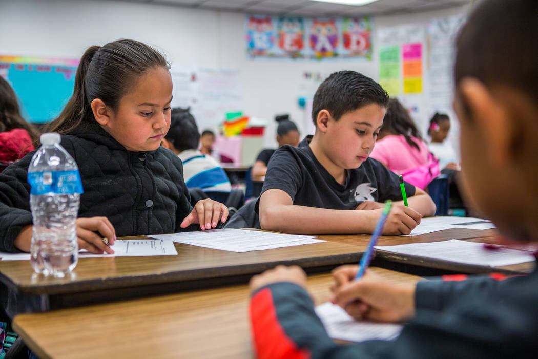 Janette Cervantes, left, and Jesus Velasco, work in Ms. Garcia's fourth grade class at H. P. Fitzgerald Elementary School in North Las Vegas on Tuesday, March 6, 2018.  Patrick Connolly Las Vegas  ...