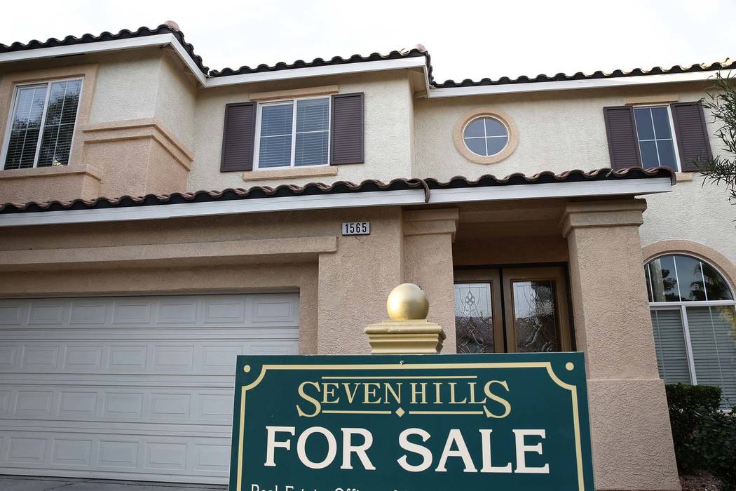A for sale sign is displayed in front of a home at Ravanusa Drive near Seven Hills Drive Wednesday, Nov. 15, 2017, in Henderson. Bizuayehu Tesfaye Las Vegas Review-Journal @bizutesfaye