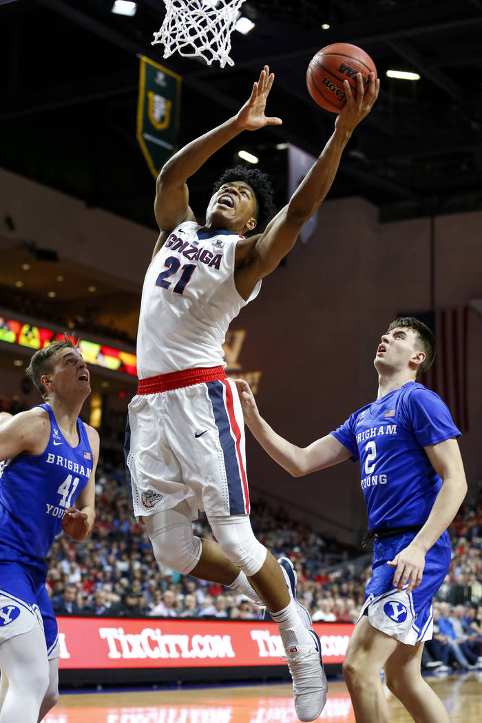 Gonzaga Bulldogs forward Rui Hachimura (21) goes up for a shot against the Brigham Young Cougars during the West Coast Conference championship game at the Orleans Arena in Las Vegas on Tuesday, Ma ...