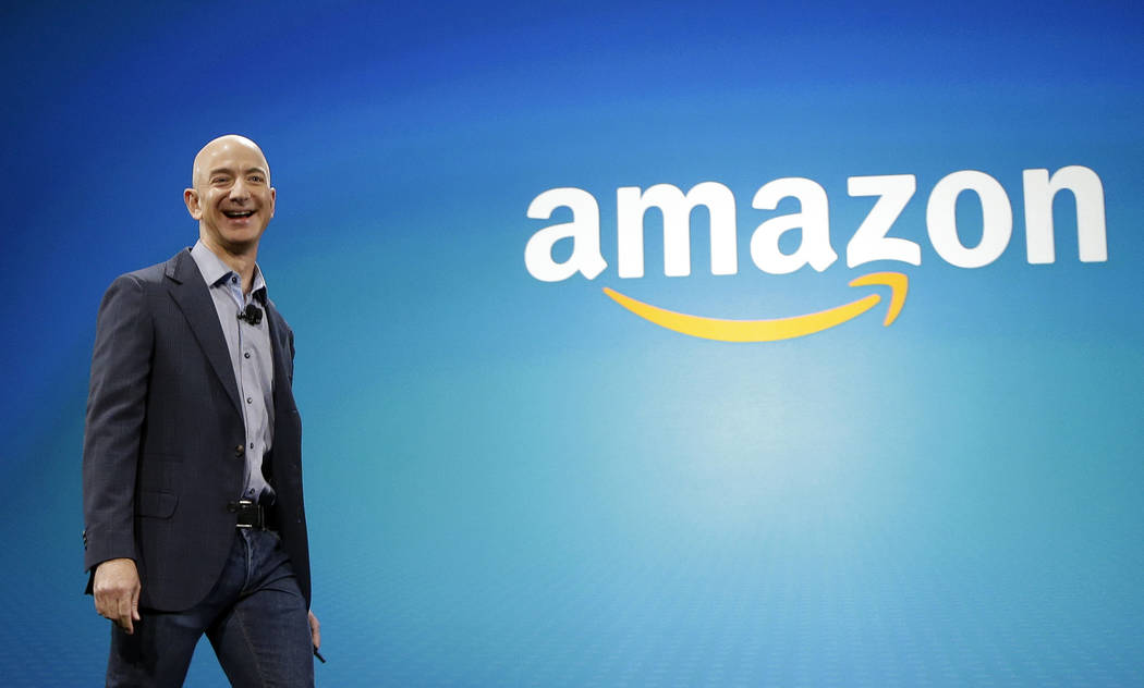 FILE - In this June 16, 2014, file photo, Amazon CEO Jeff Bezos in Seattle. (AP Photo/Ted S. Warren, File)
