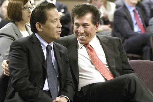 Las Vegas casino mogul Steve Winn, right, talking with his business partner Kazuo Okada during a Gaming Commission hearing in Carson City, Nev., June 17, 2004.  (Las Vegas Review-Journal, File)