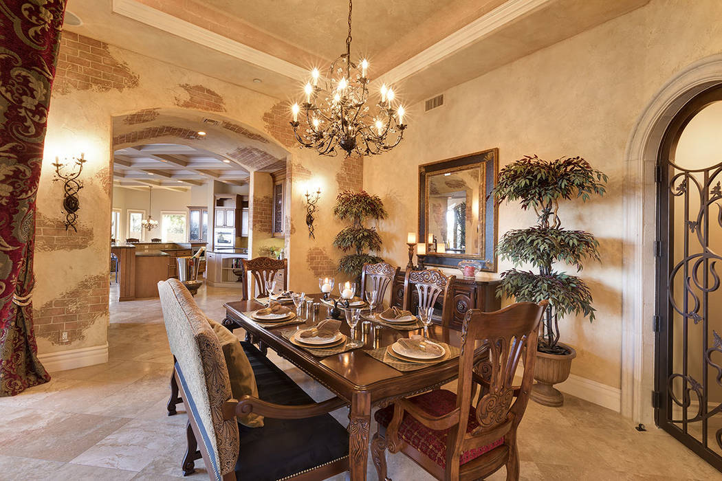 The formal dining room has a Tuscan touch. (Synergy/Sotheby’s International Realty)