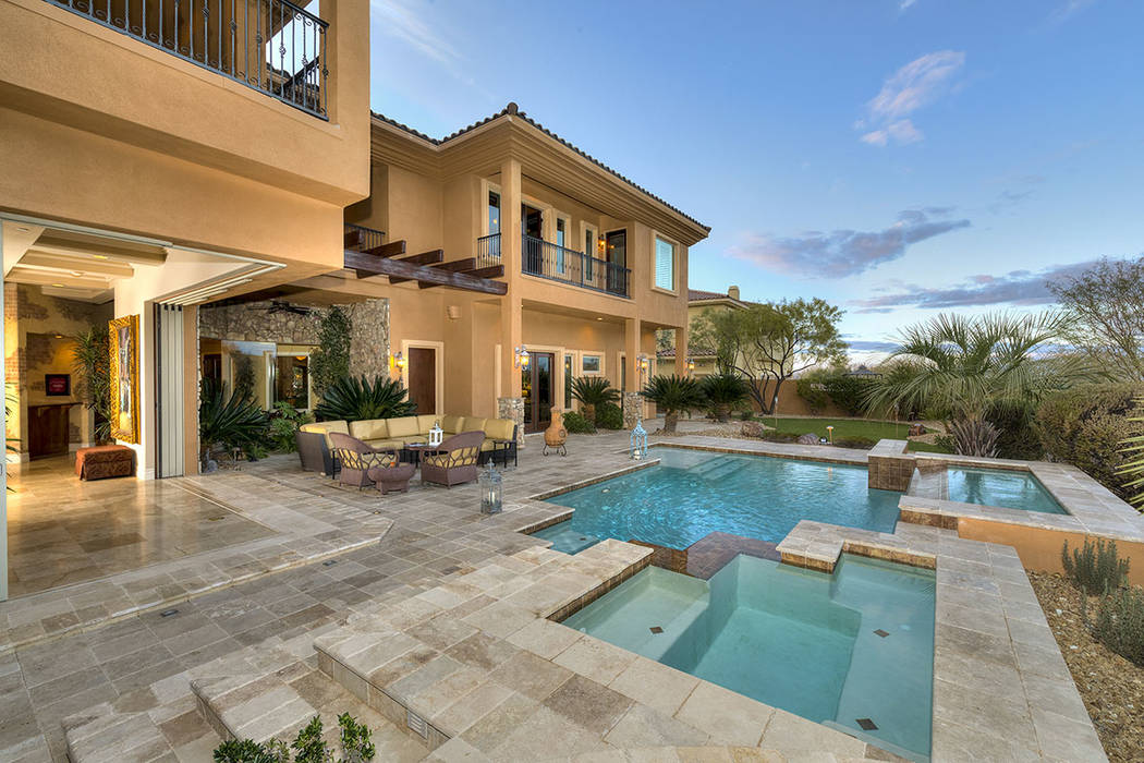 The home has a pool, spa and outdoor kitchen.  (Synergy/Sotheby’s International Realty)