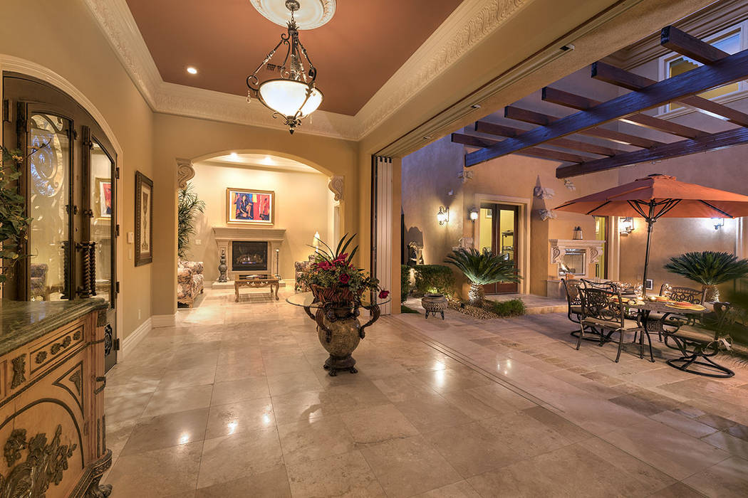 The home features outdoor-indoor living. (Synergy/Sotheby’s International Realty)