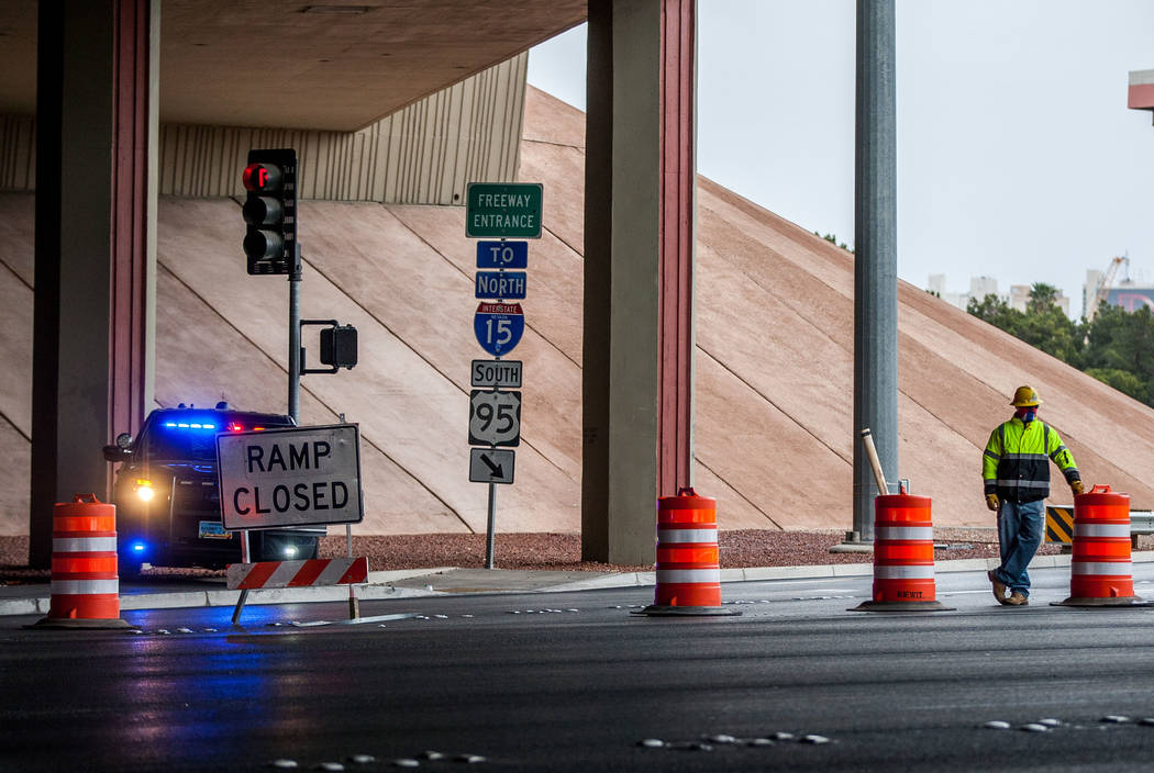 A construction worker and Nevada Highway Patrol trooper watch over the closed on-ramp to U.S. Highway 95 on Rancho Drive in Las Vegas on Saturday, March 10, 2018.  Patrick Connolly Las Vegas Revie ...