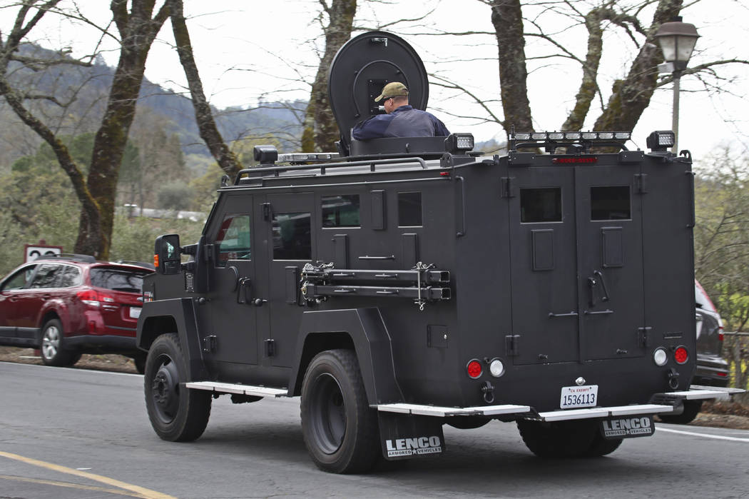 An armored vehicle arrives at the Veterans Home of California in Yountville, Calif., on Friday March 9, 2018. A gunman took at least three people hostage at the largest veterans home in the United ...