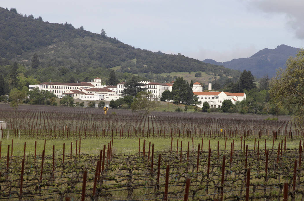 File - In this April 17, 2011 file photo, vineyards are shown in front of the Veterans Home of California in Yountville, Calif. Napa County Fire captain Chase Beckman says a gunman has taken hosta ...