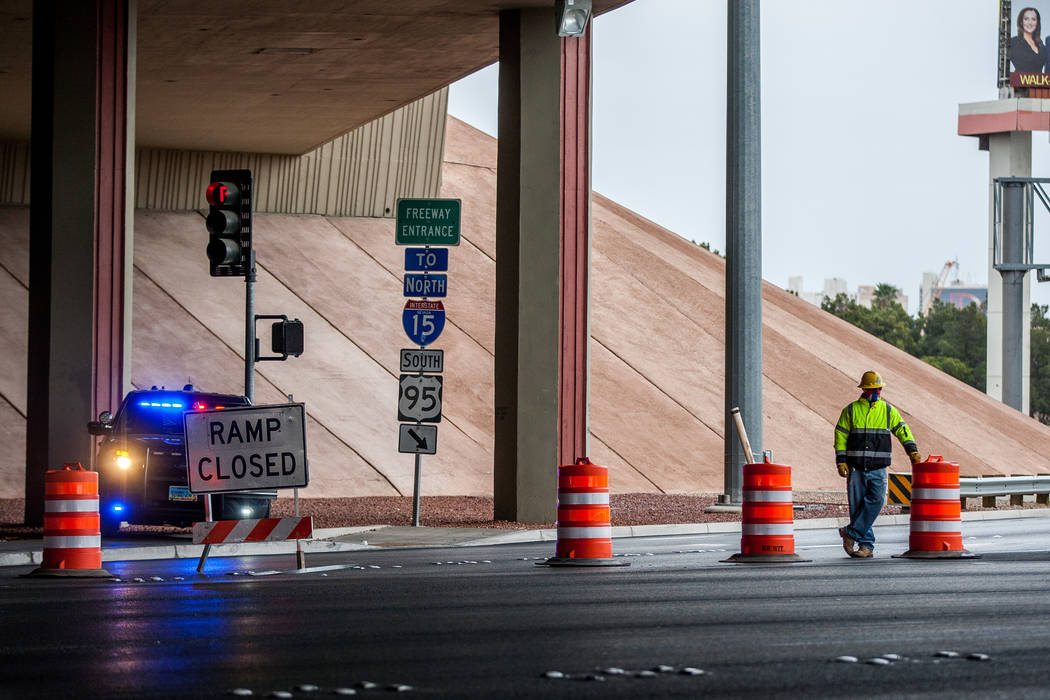 A construction worker and Nevada Highway Patrol trooper watch over the closed on-ramp to U.S. Highway 95 on Rancho Drive in Las Vegas on Saturday, March 10, 2018. 
Patrick Connolly Las Vegas Revie ...
