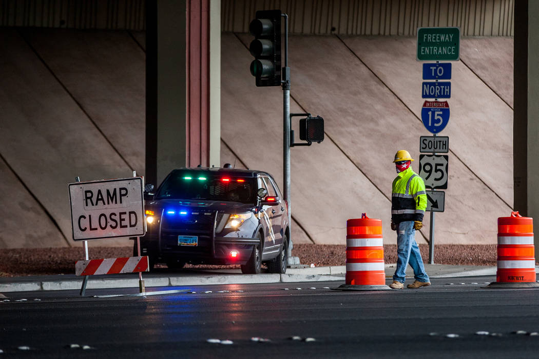 A construction worker and Nevada Highway Patrol trooper watch over the closed on-ramp to U.S. Highway 95 on Rancho Drive in Las Vegas on Saturday, March 10, 2018. Patrick Connolly Las Vegas Review ...