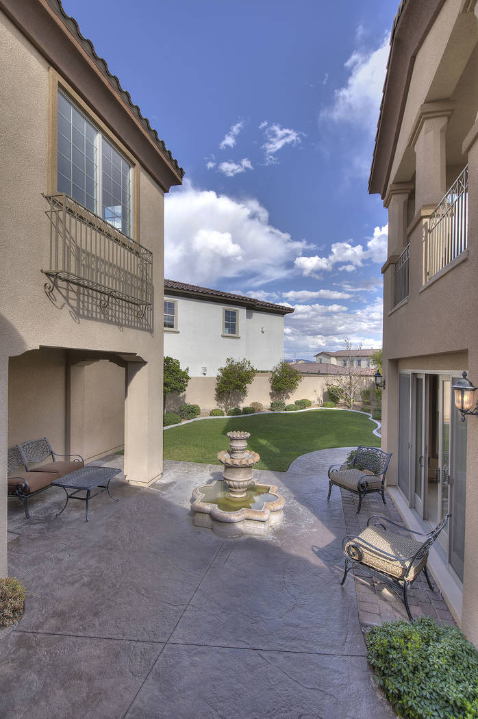The home has a courtyard. (Synergy/Sotheby’s International Realty)